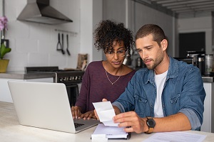 Young Couple Examining Finances 